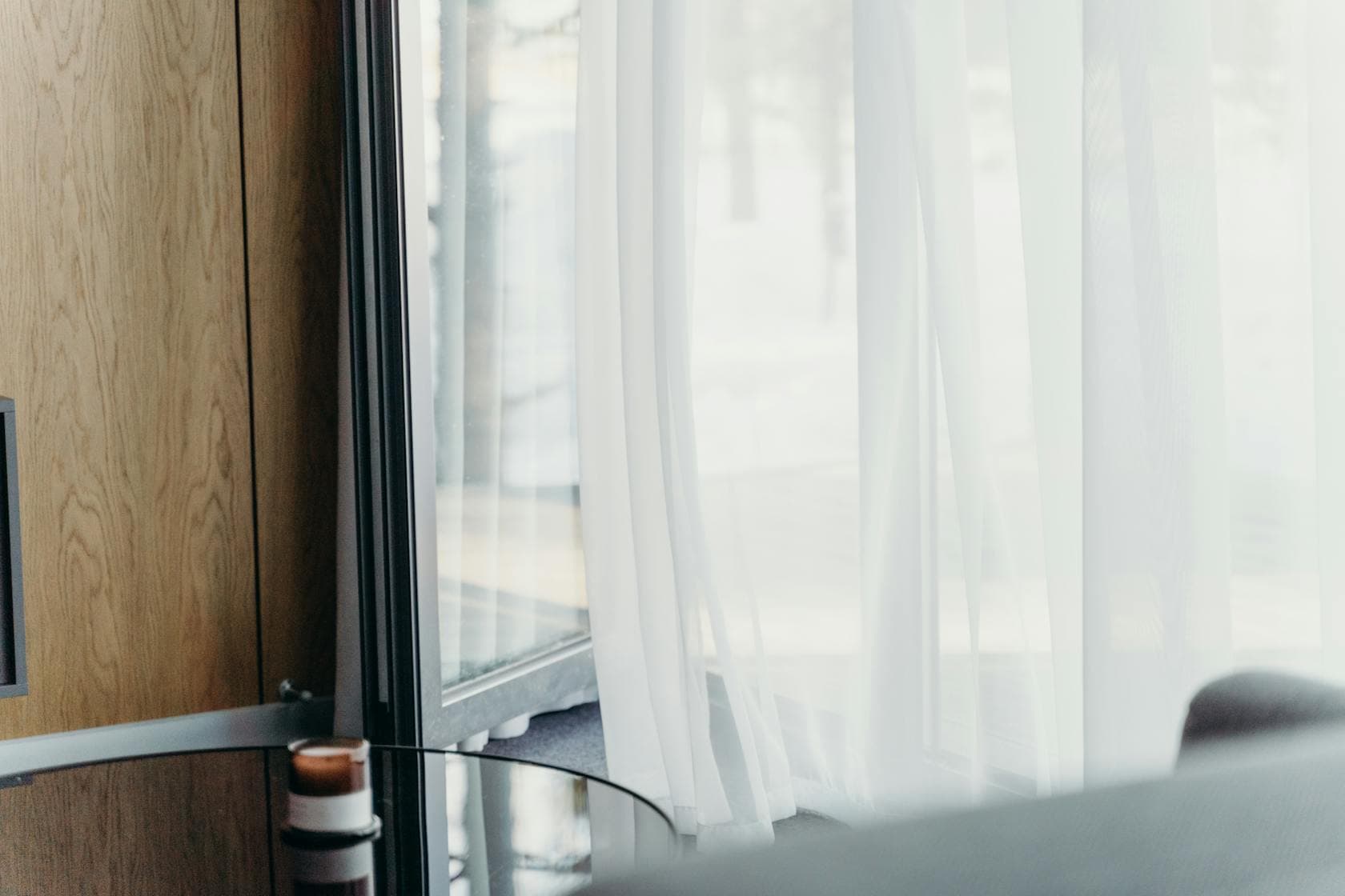 Layered fabrics and textures in an interior scheme