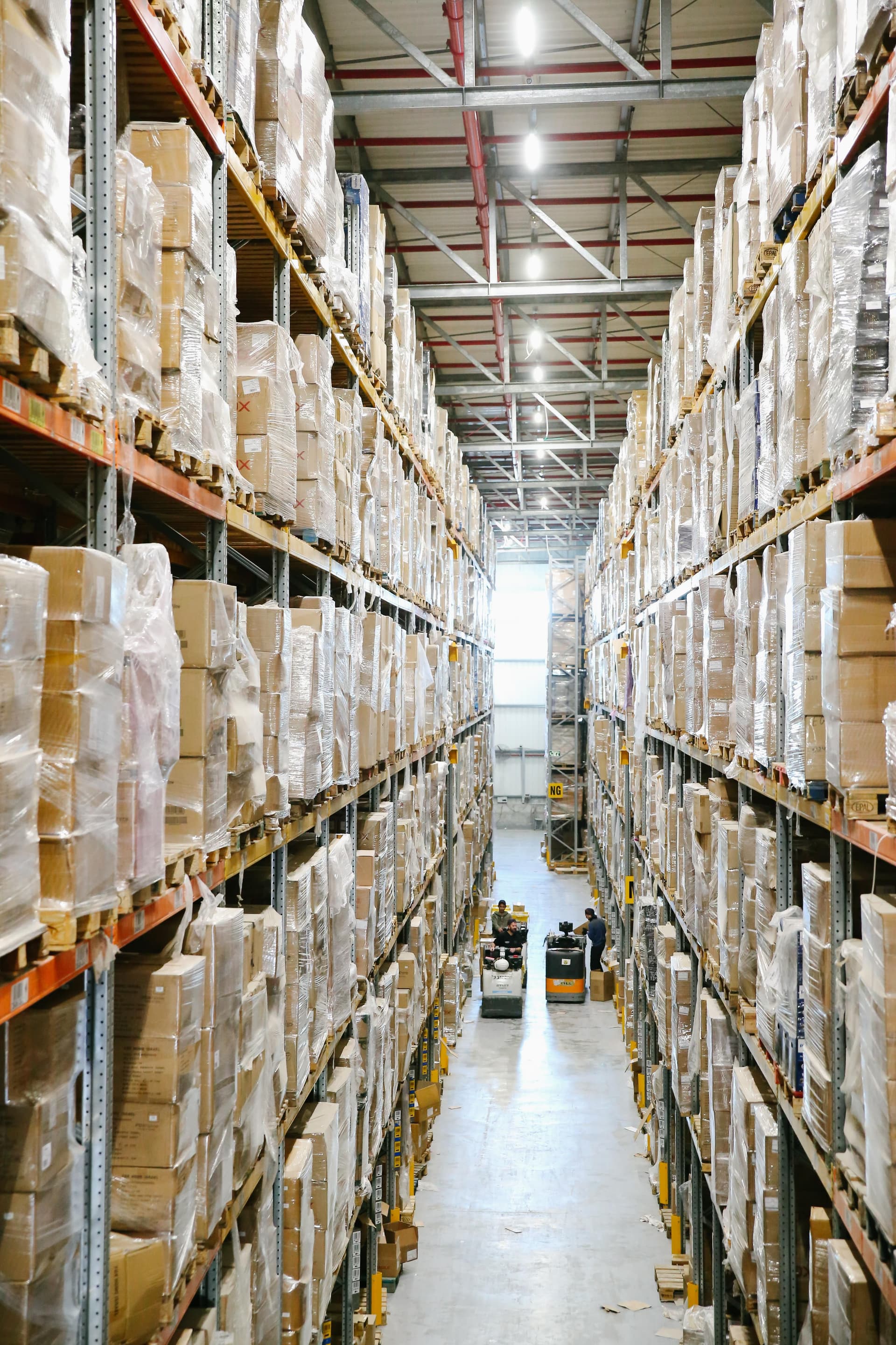 Warehouse shelving and logistics representing the FF&E procurement and supply chain process